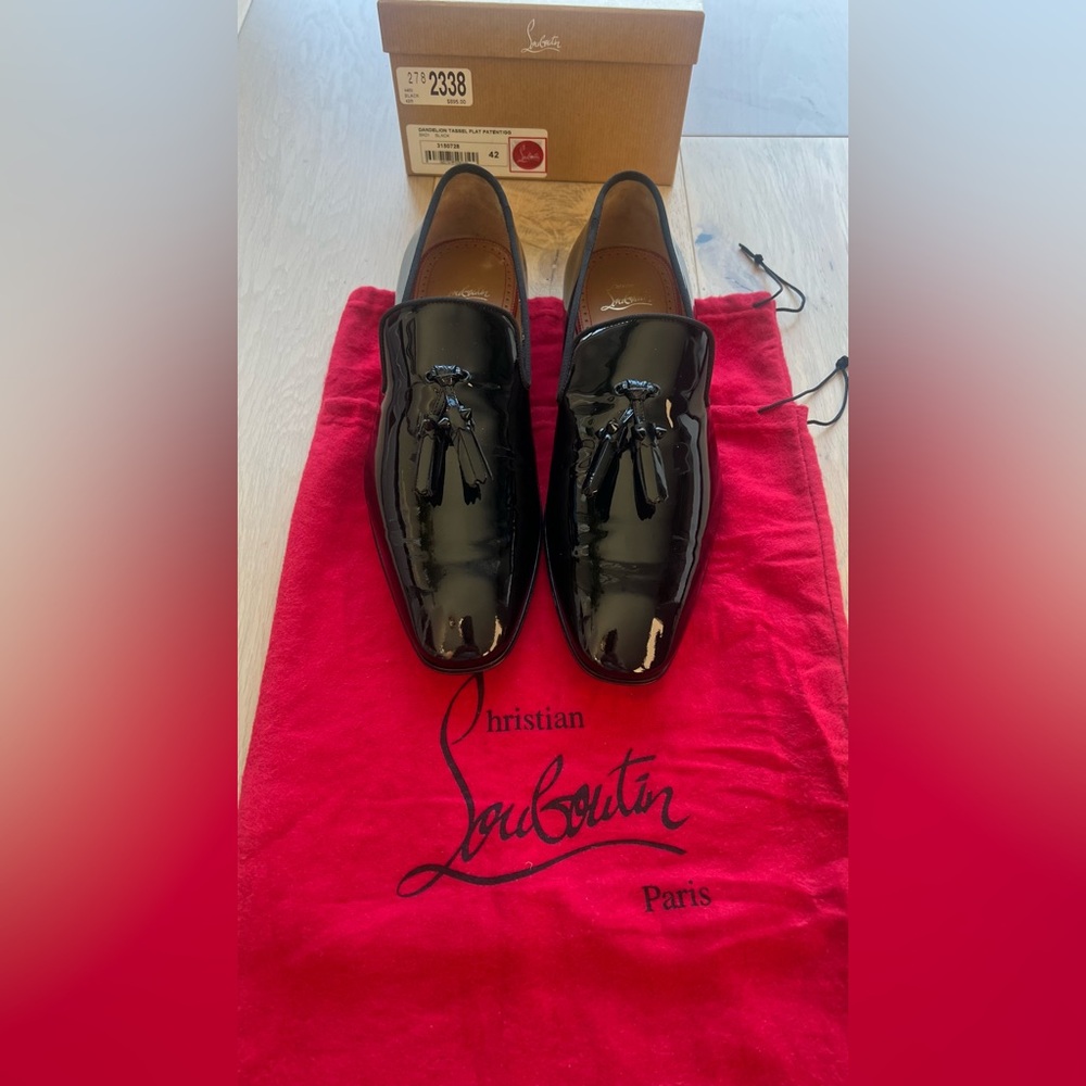 Christian Louboutin Men’s
Black Patent Dandelion Tassel Loafer